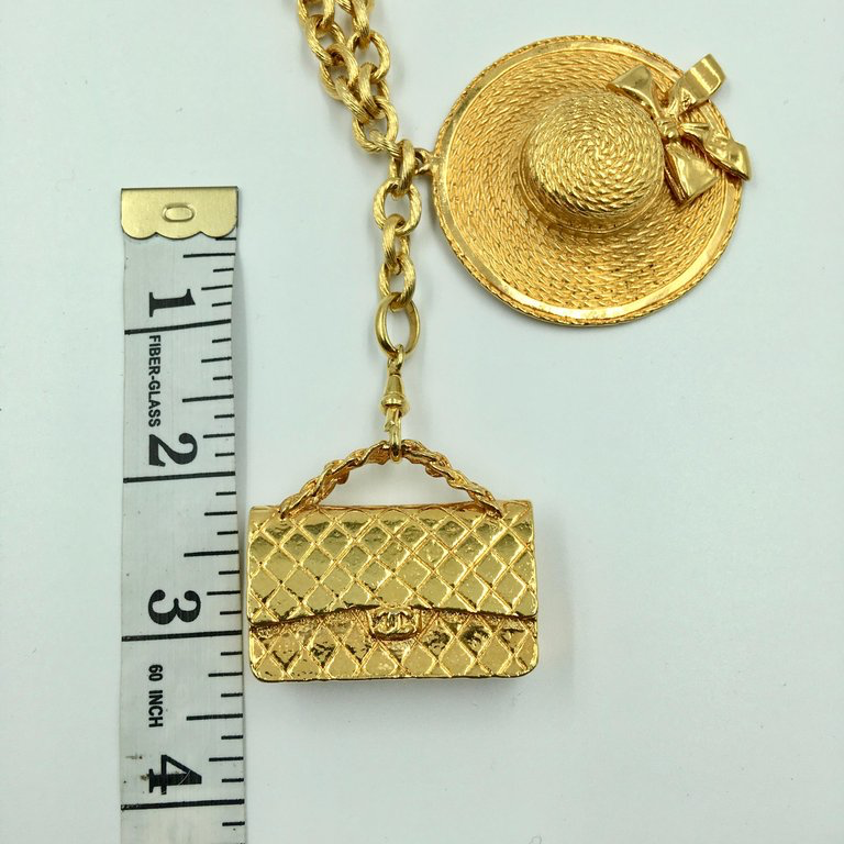 Chanel Gold Tone Classic Coco Chanel Chapeau and Quilted Handbag Charm Necklace
