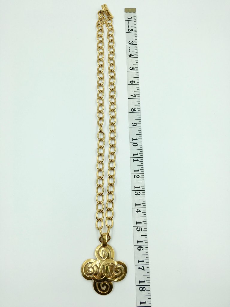 Chanel Gold Tone CC Logo Swirl Cross Necklace