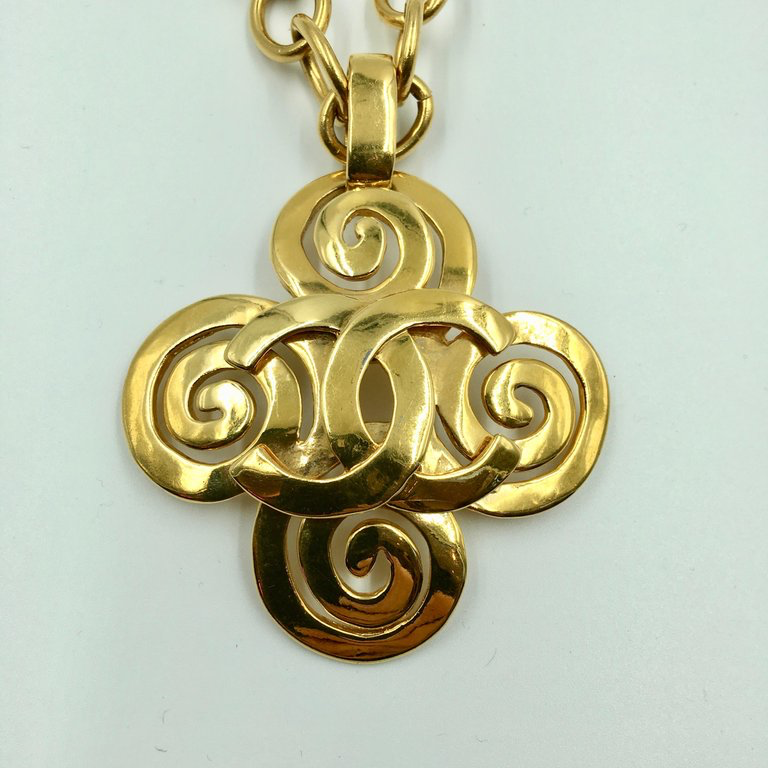 Chanel Gold Tone CC Logo Swirl Cross Necklace