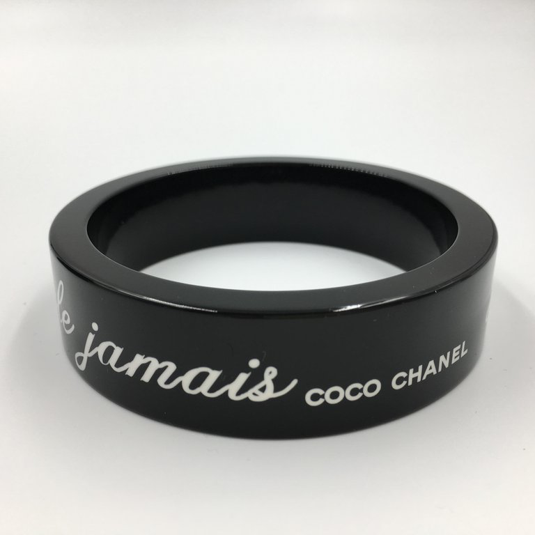 Chanel Black Logo Bangle - La Mode se Demode. Le Style Jamais Coco Chanel