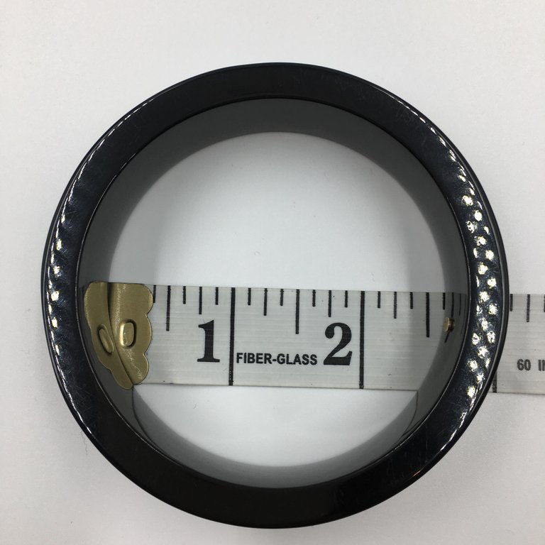 Chanel Black Logo Bangle - La Mode se Demode. Le Style Jamais Coco Chanel