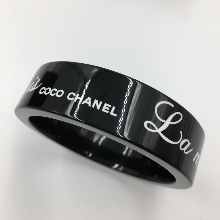 Chanel Black Logo Bangle - La Mode se Demode. Le Style Jamais Coco Chanel
