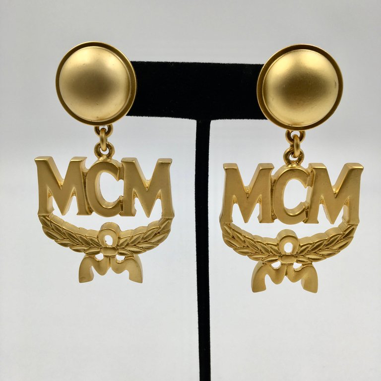 MCM Wreath Logo Matte Gold Tone Clip On Earrings