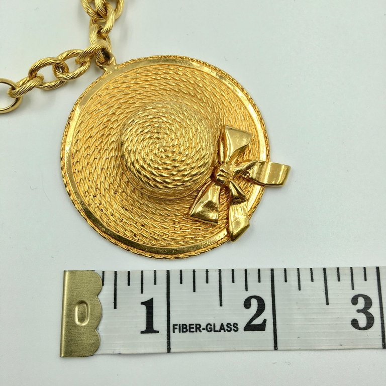 Chanel Gold Tone Classic Coco Chanel Chapeau and Quilted Handbag Charm Necklace