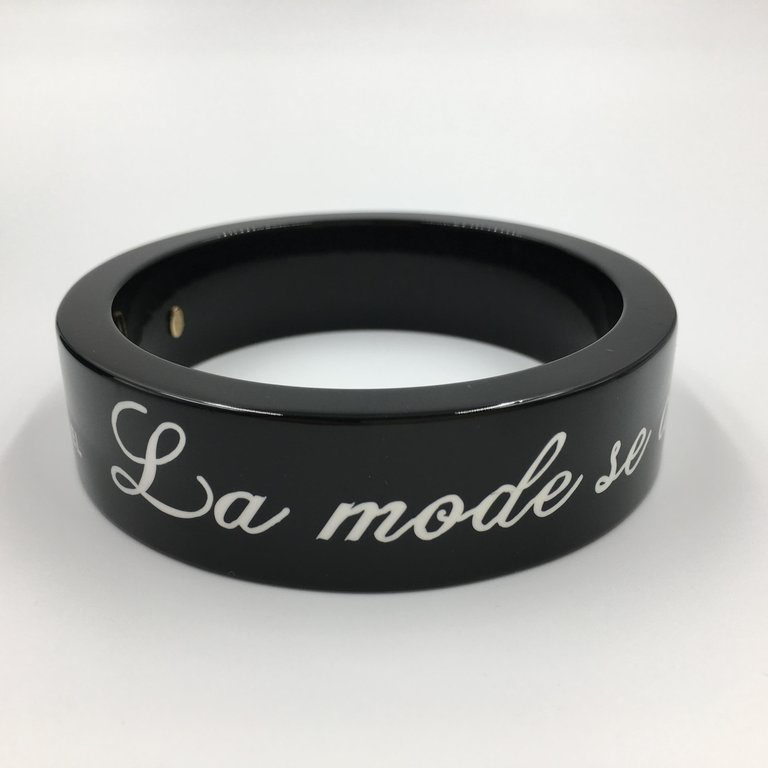 Chanel Black Logo Bangle - La Mode se Demode. Le Style Jamais Coco