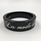 Chanel Black Logo Bangle - La Mode se Demode. Le Style Jamais Coco Chanel